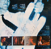 Back cover - signed by the rest of the band